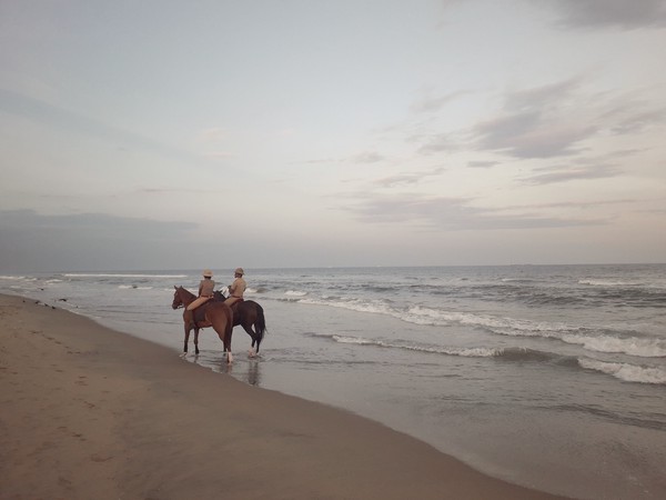 Guards patrolling at high tides of Marina Beach